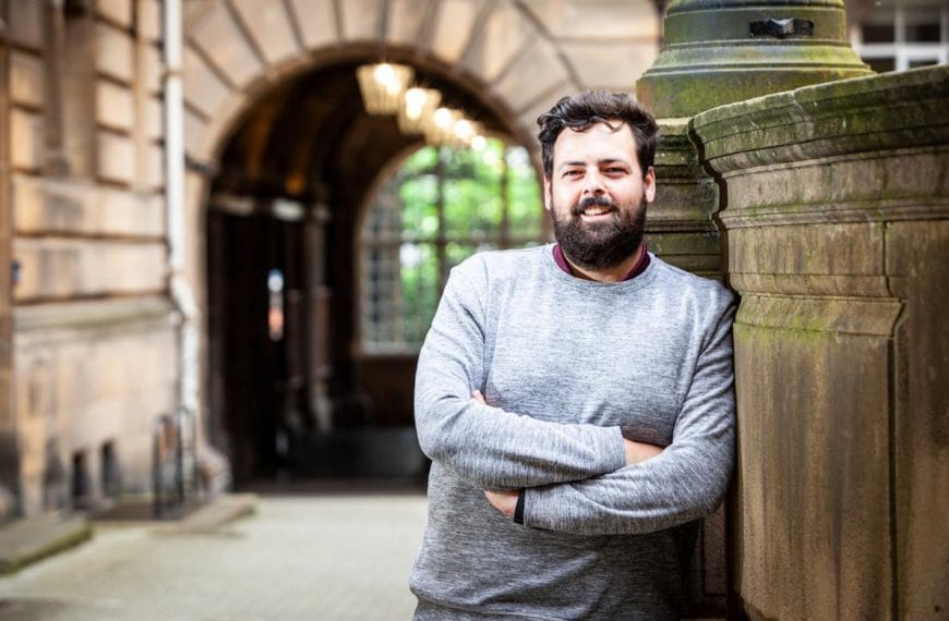 A portrait of Ross Morrison outside the William Robertson Wing