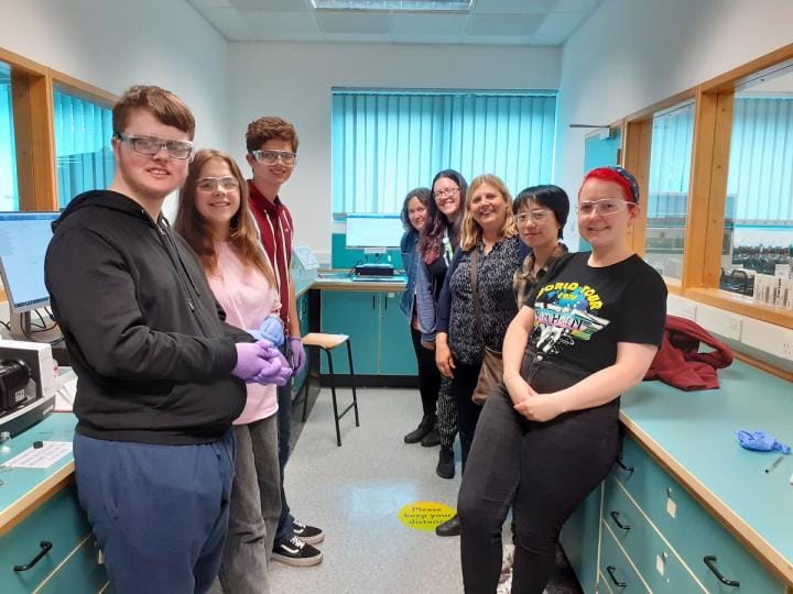 A group of deaf students in a University lab