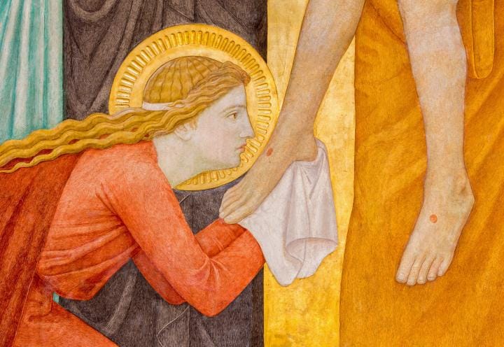 Mary at Jesus' feet