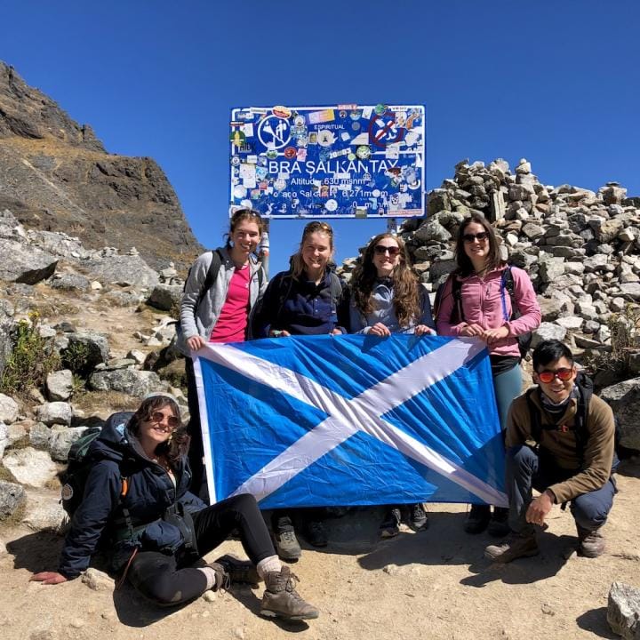 Students hold a Scotland flag