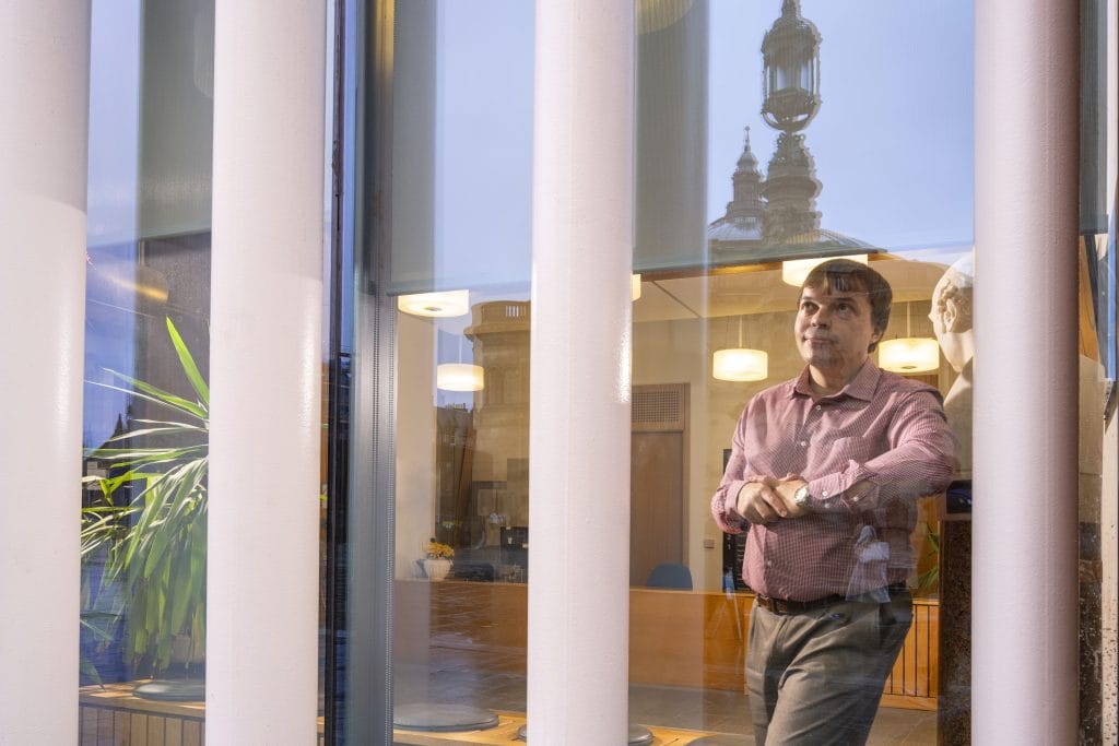 Academic standing in the Dugald Stewart building at the University of Edinburgh.