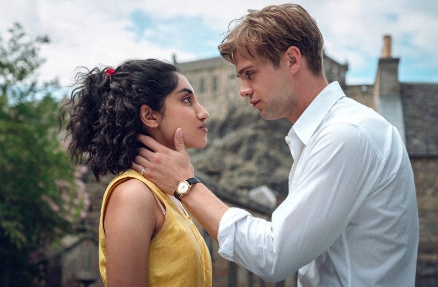 Emma and Dex from One Day in front of Edinburgh Castle