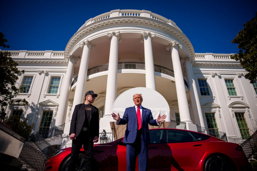 President Trump and Elon Musk in front of White House. Announcing international aid cuts.
