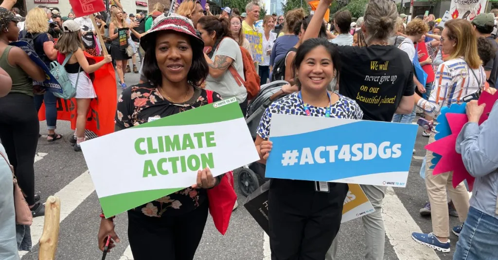 Two young women at a climate change protest 