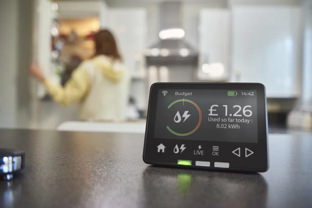 Smart meter showing energy usage and cost.