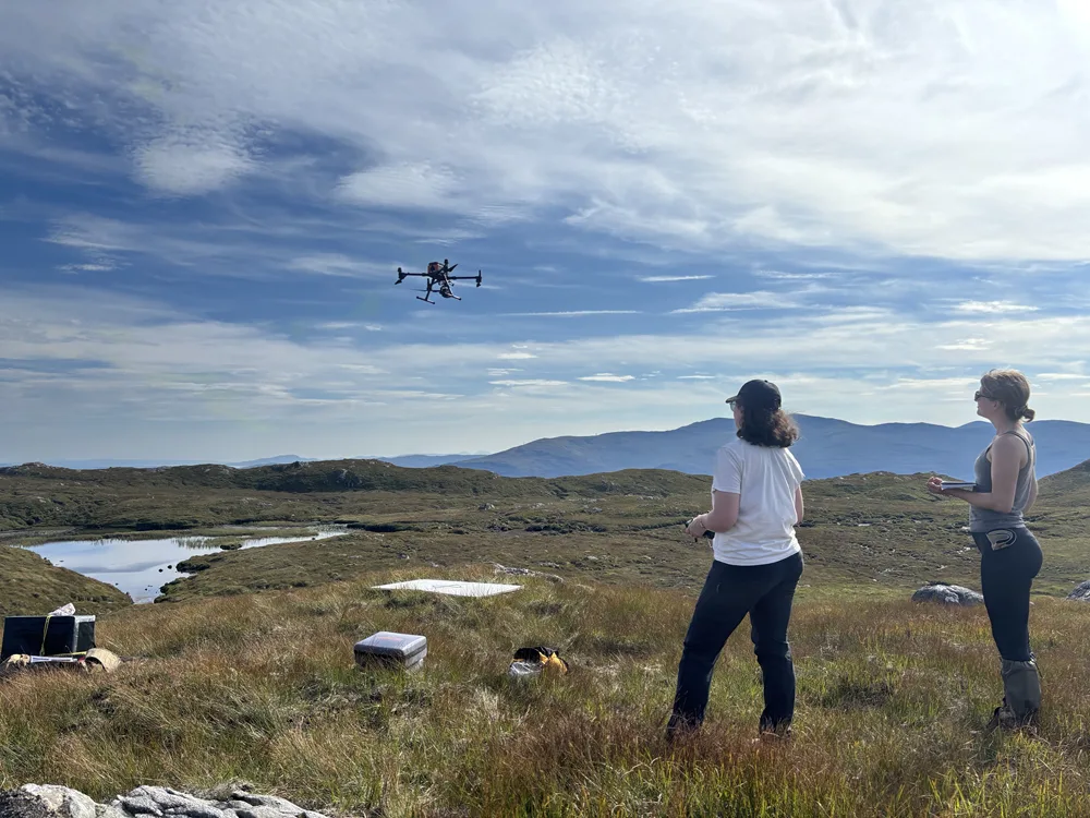 (L-R) Rachel Orchard and Tilda Tarrant deploy a drone over Ardtornish Estate, Morvern