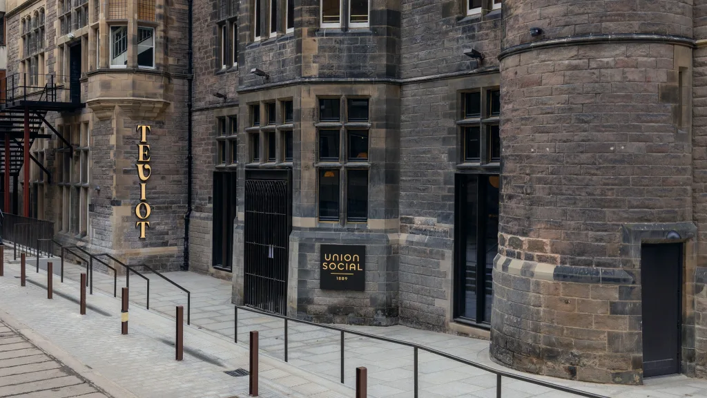 An exterior view of the new entrance to Teviot from Charles Street Lane, which now gives level access to the rear of the building. Image features the new entrance, level access and doors. 