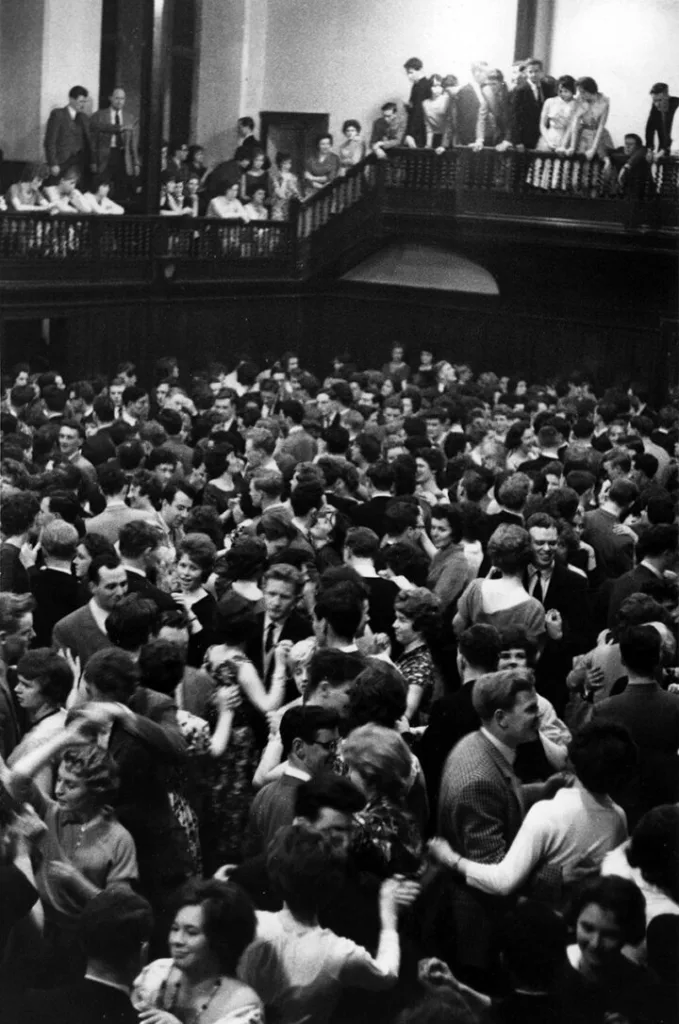 An archive image of hundreds of students enjoying a dance in the Teviot Debating Hall in the 1960s.