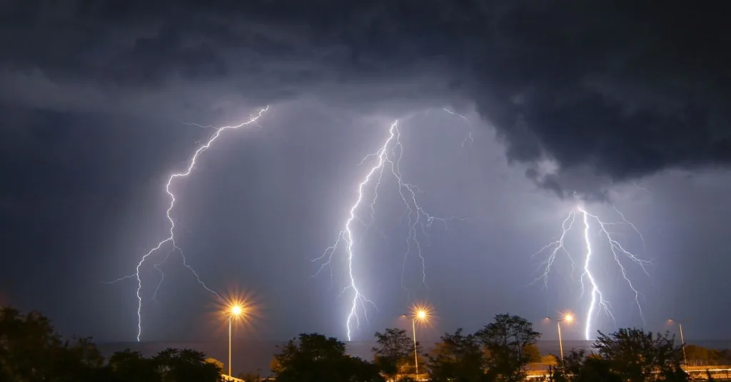 Dark clouds and lightning on a street 