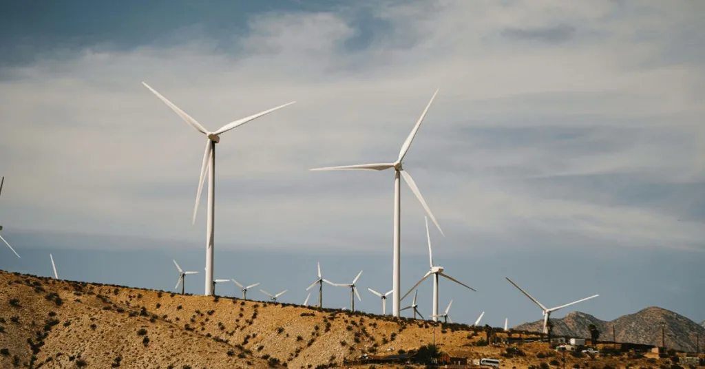 Windmills against blue sky