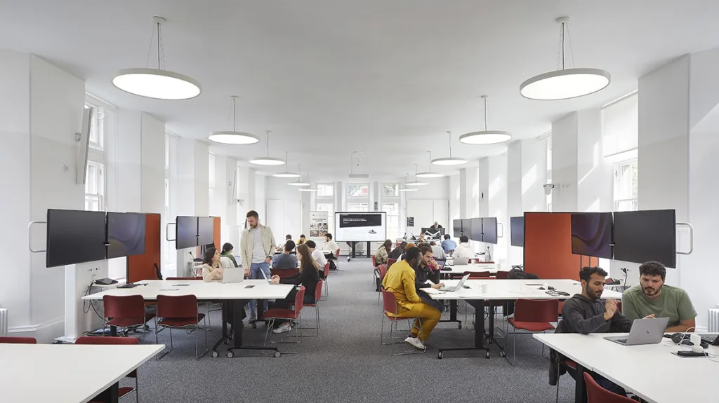 The original Nightingale Wards are wide, airy spaces repurposed for use as workspaces.