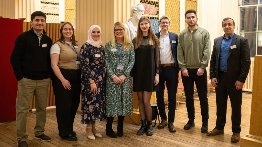 A group of Education Beyond Borders scholarship students and team members pictured during an event celebrating the programme's first anniversary in January 2025.
