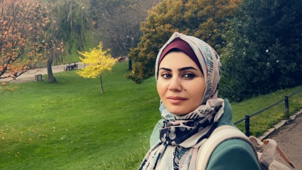 Cara scholar Amani Ahmed pictured outdoors in Edinburgh.