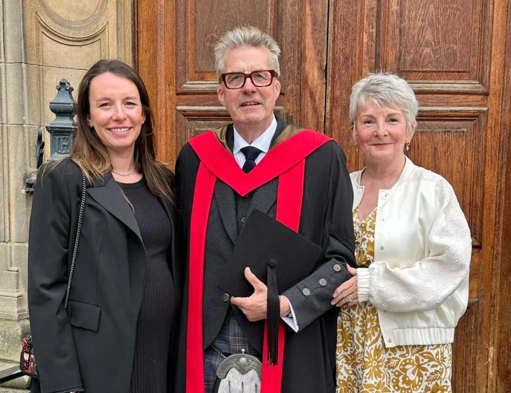 Christopher Wheeler (centre), with his daughter (left) and wife (right)